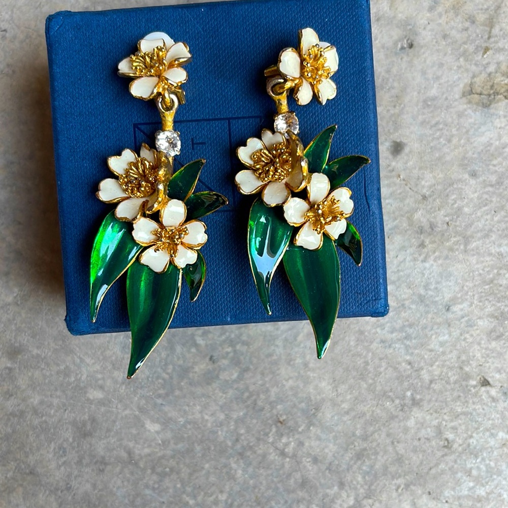 Oscar de la Rental signed floral earrings.